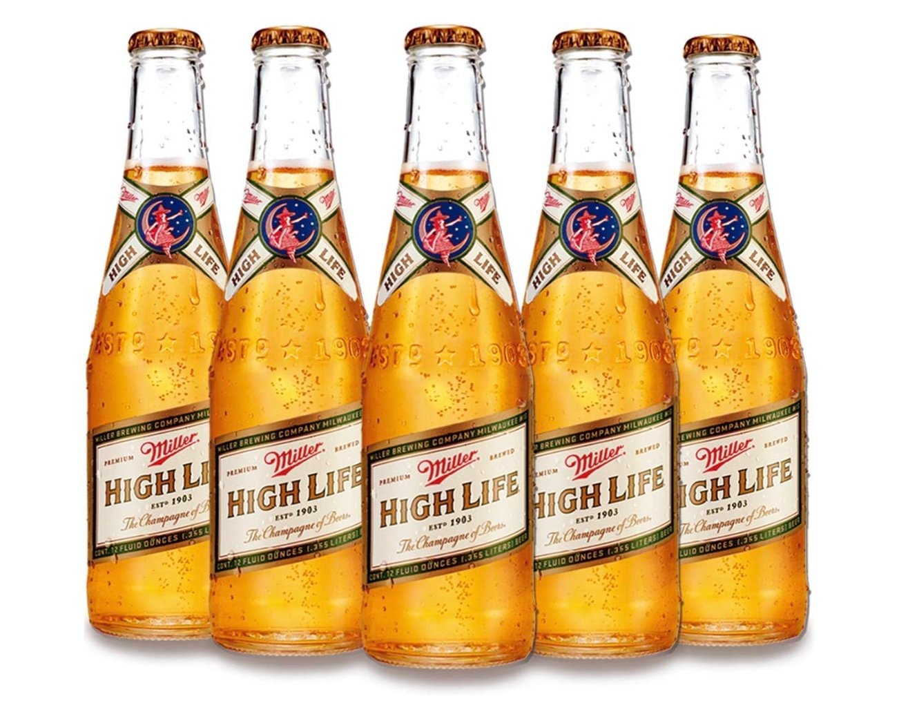 Five bottles of Miller High Life beer are standing upright in a row, with golden beer visible and condensation on the glass. The beige and red labels read “Miller High Life.”