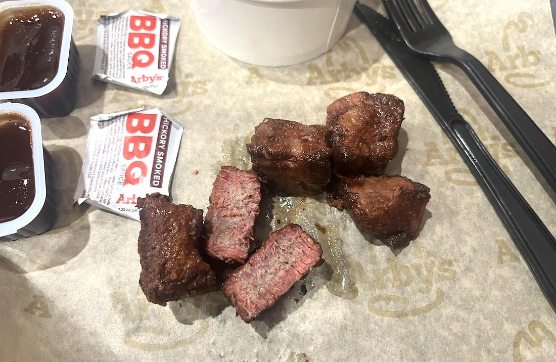 A group of meat on a paper
