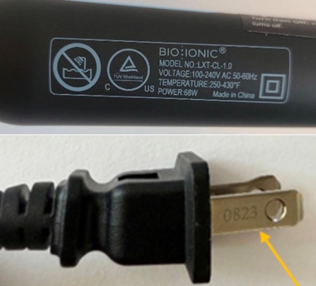 A close-up of a Bio Ionic hair styling tool label showing model, voltage, and temperature info, and a black power plug with a yellow arrow pointing to the numbers "0823" stamped on the metal prong.