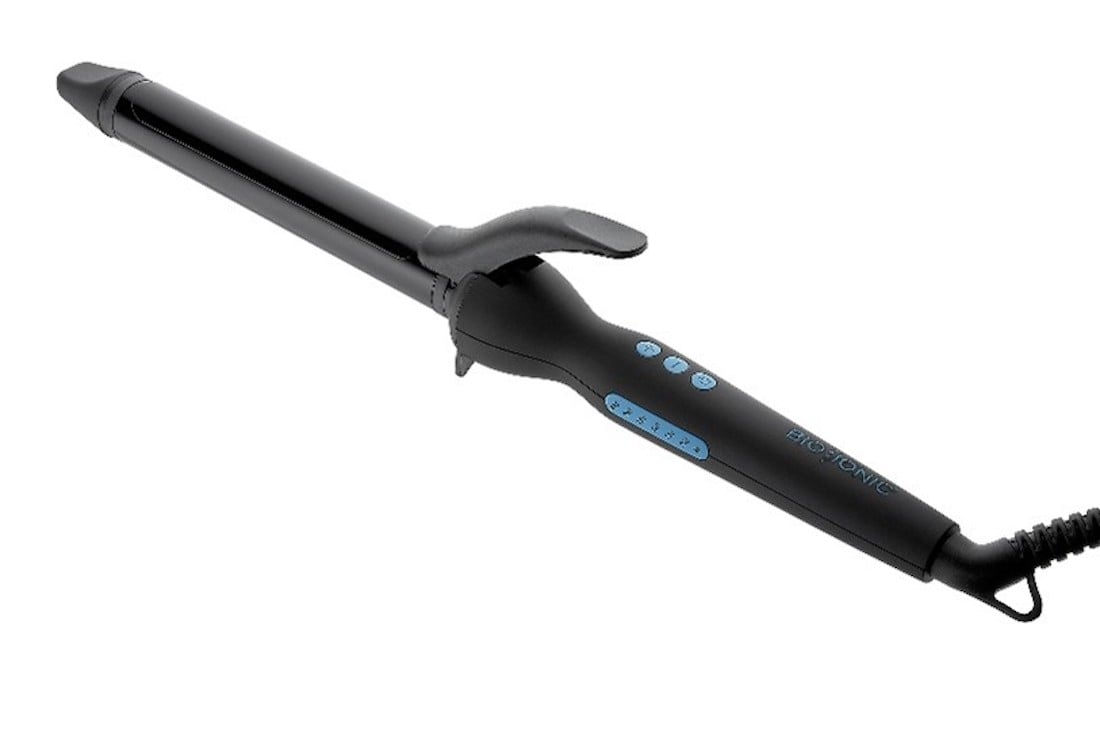 A black electric curling iron with a clamp, digital control buttons, and a power cord attached at the handle.