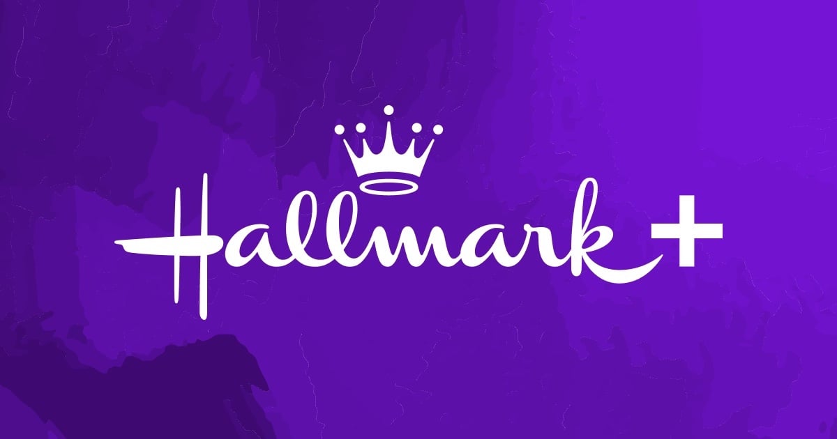 White "Hallmark" script with a crown above the "ll," followed by a plus sign, on a purple textured background.