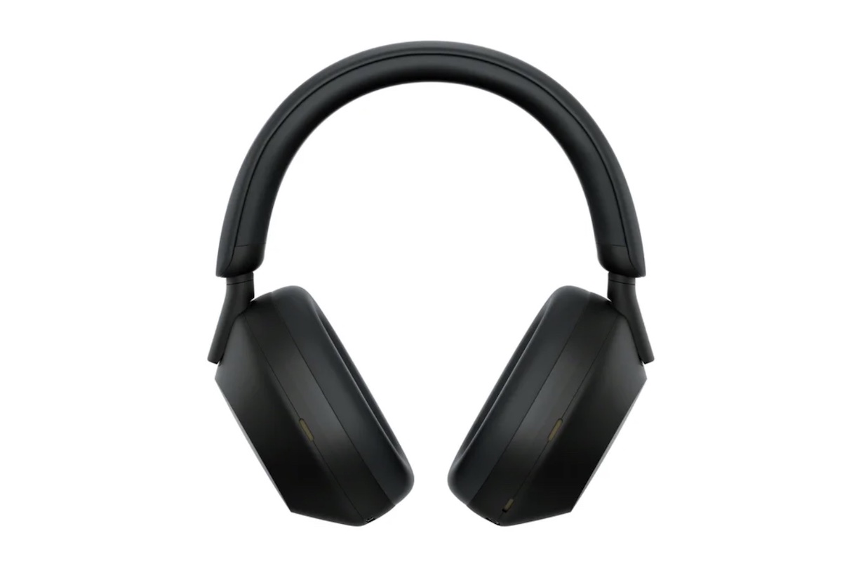 A pair of over-ear, wireless black headphones with a padded headband and large ear cups, displayed against a plain white background.