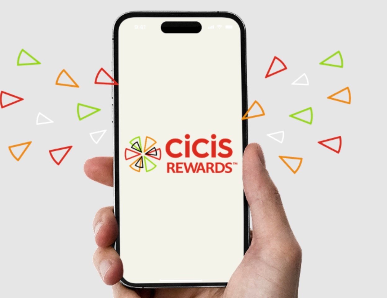 A hand holds a smartphone displaying the Cicis Rewards app logo, surrounded by red, green, and orange pizza slice icons on a light gray background.