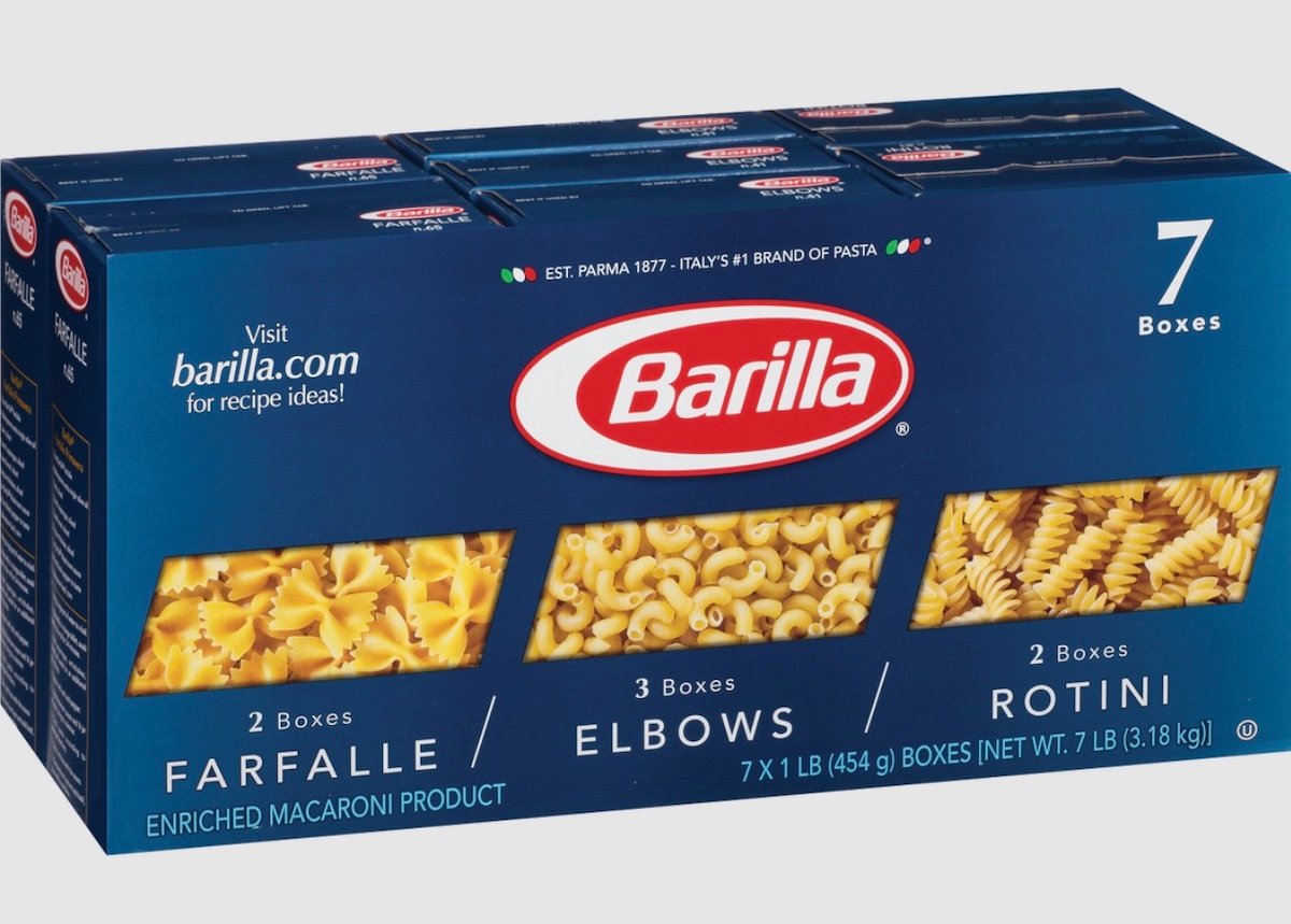 A blue Barilla pasta variety pack features 7 boxes: 2 Farfalle, 3 Elbows, and 2 Rotini. Each type is shown through clear windows on the package, with the Barilla logo prominently displayed.