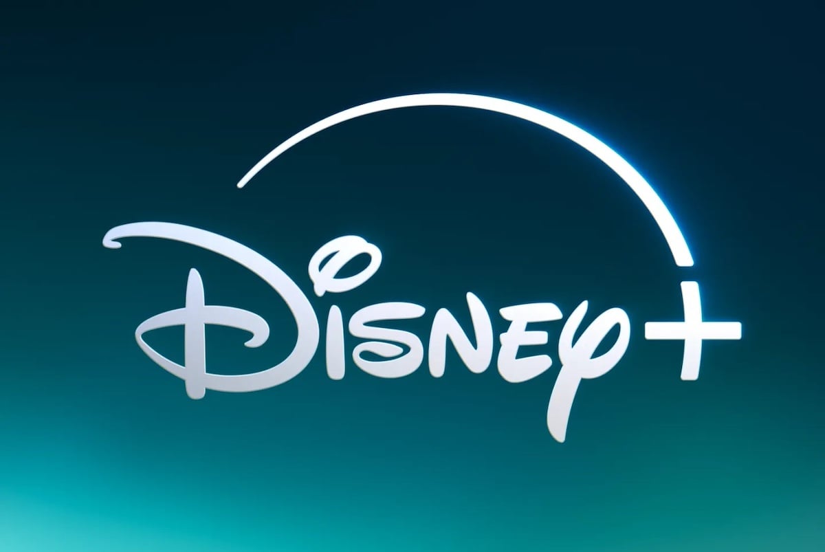 The Disney+ logo in white text on a blue gradient background, with a curved line arching over the text and ending at a plus sign.