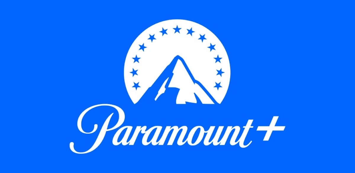 Paramount+ logo featuring a stylized mountain with a ring of stars above it, and the word "Paramount+" in cursive below, all in white on a blue background.
