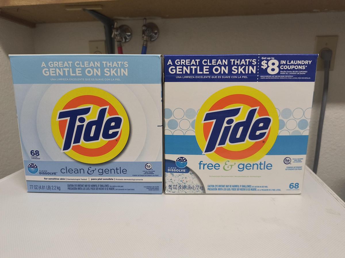 Two boxes of Tide laundry detergent on a shelf. The left box is labeled "clean & gentle" and the right box is labeled "free & gentle." Both boxes advertise being gentle on skin and contain 68 loads each.