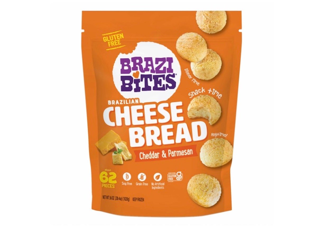 An orange bag of Brazi Bites Brazilian Cheese Bread in cheddar & parmesan flavor, labeled gluten free and containing 62 pieces. The packaging shows images of bite-sized cheese breads.