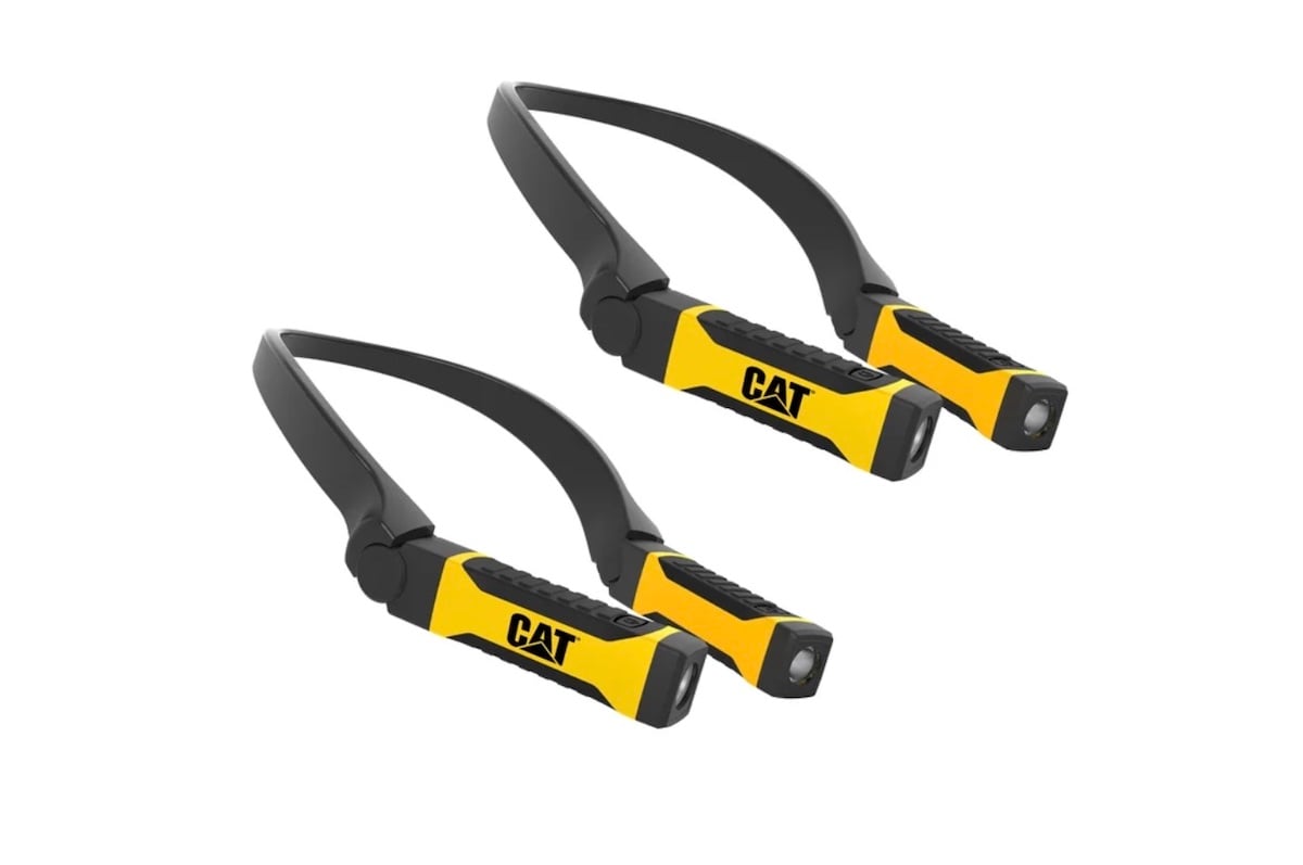 Two black and yellow CAT brand headlamps with adjustable bands, shown side by side on a white background.