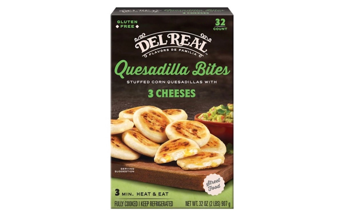 A box of Del Real Quesadilla Bites featuring stuffed corn quesadillas with three cheeses. The package shows several quesadilla bites on a wooden board and highlights that it contains 32 pieces and is gluten-free.