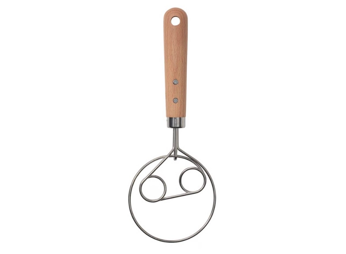 A Danish dough whisk with a wooden handle and a circular stainless steel wire head, designed for mixing dough and batters.