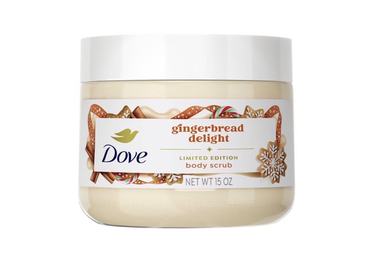 A jar of Dove Gingerbread Delight Limited Edition body scrub, 15 oz, with a festive label featuring gingerbread cookies and candy canes.