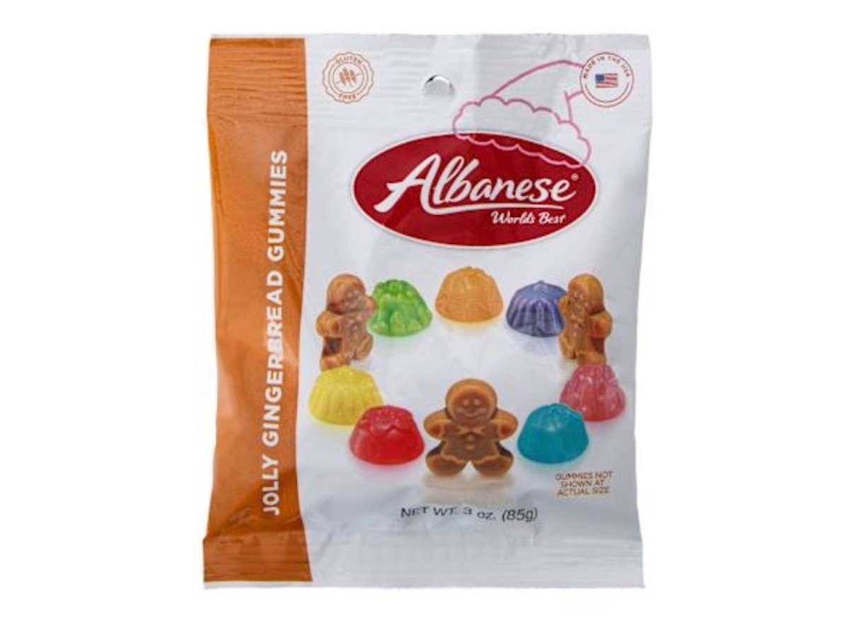 A bag of Albanese Jolly Gingerbread Gummies, featuring images of colorful gumdrop and gingerbread man-shaped gummies on the front, with orange and white packaging.