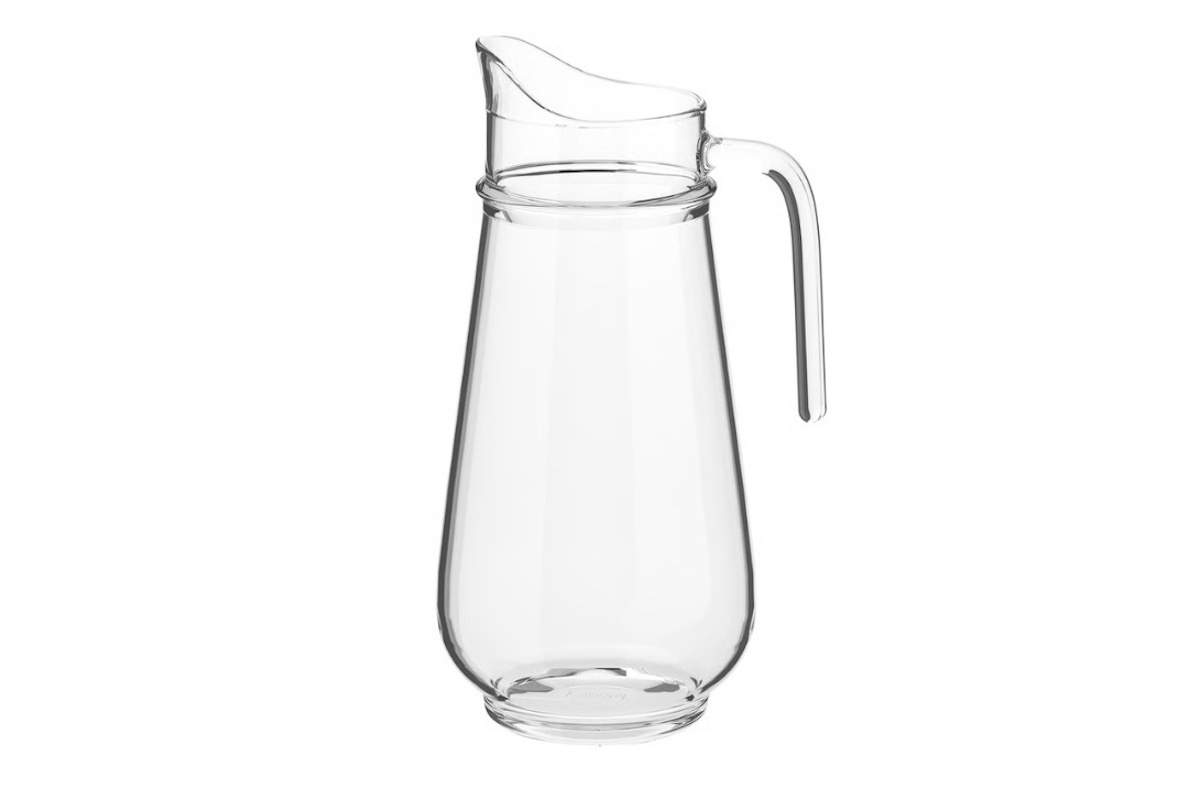 A clear, empty glass pitcher with a handle and a spout, placed against a white background.