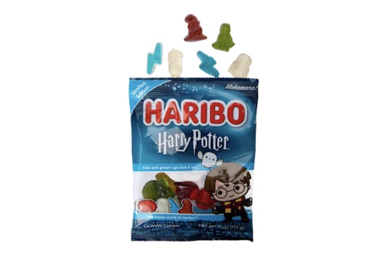 A bag of HARIBO Harry Potter gummy candy with the Harry Potter logo and cartoon Harry on the packaging; several gummies in shapes like a hat, lightning bolt, and owl are displayed above the bag.