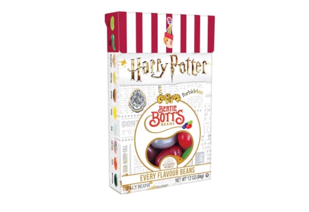 A box of Harry Potter Bertie Bott’s Every Flavour Beans featuring colorful jelly beans, a whimsical design, and red-and-white striped top packaging. The front displays the logo and magical-themed graphics.