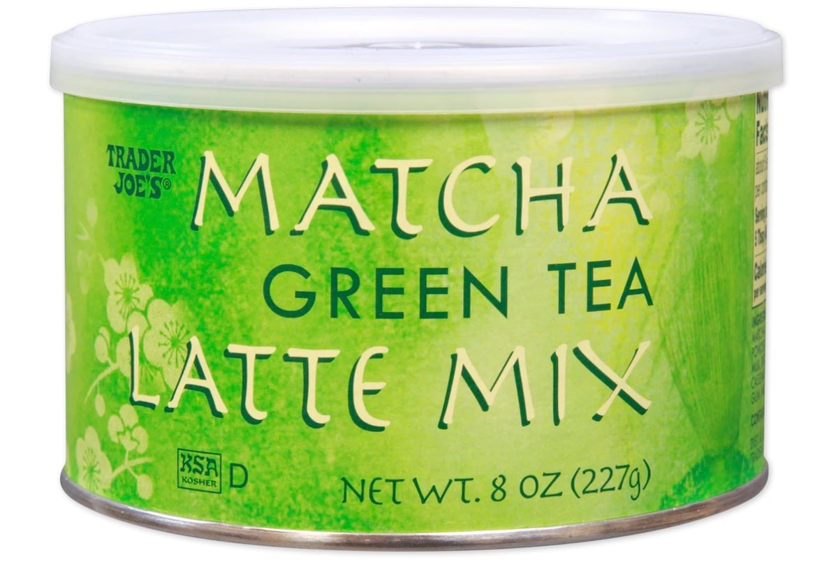 A round green container of Trader Joe’s Matcha Green Tea Latte Mix with white and green text. The container holds 8 oz (227g) and features floral designs on the label.