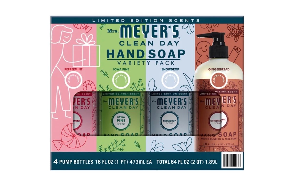 A boxed set of four Mrs. Meyer’s Clean Day hand soaps in limited edition scents: Peppermint, Iowa Pine, Snowdrop, and Gingerbread. Each pump bottle contains 16 fl oz. Packaging features festive designs.