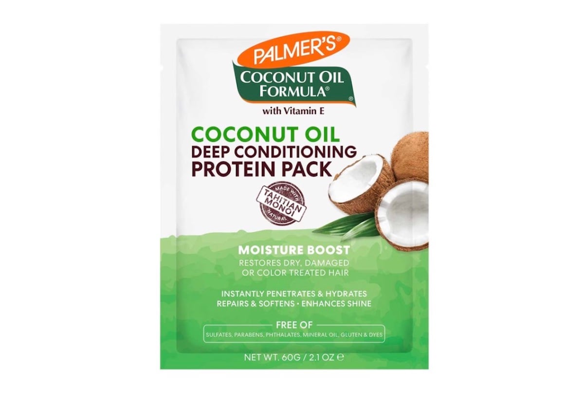 Front of a Palmer’s Coconut Oil Formula Deep Conditioning Protein Pack sachet, featuring images of coconuts and text highlighting moisture boost benefits for hair. The pack displays it is free of sulfates, parabens, phthalates, mineral oil, and gluten.