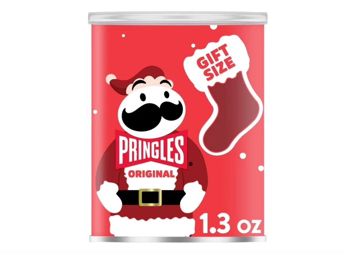 A red Pringles can featuring the Pringles mascot dressed as Santa Claus, with a “Gift Size” label inside a stocking graphic, and “1.3 oz” displayed at the bottom.