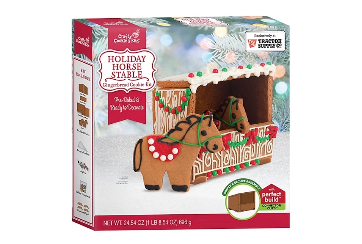 Box of a Crafty Cooking Kits Holiday Horse Stable Gingerbread Cookie Kit, featuring decorated gingerbread horses and a cookie stable. The box shows the finished product and includes festive holiday designs.