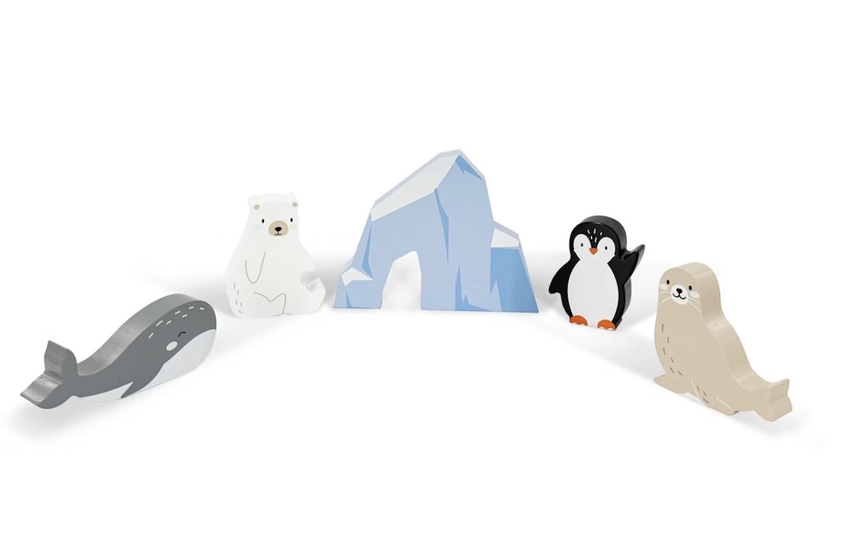 Five wooden arctic animal toys, including a whale, polar bear, iceberg, penguin, and seal, are arranged in a semi-circle on a white background.
