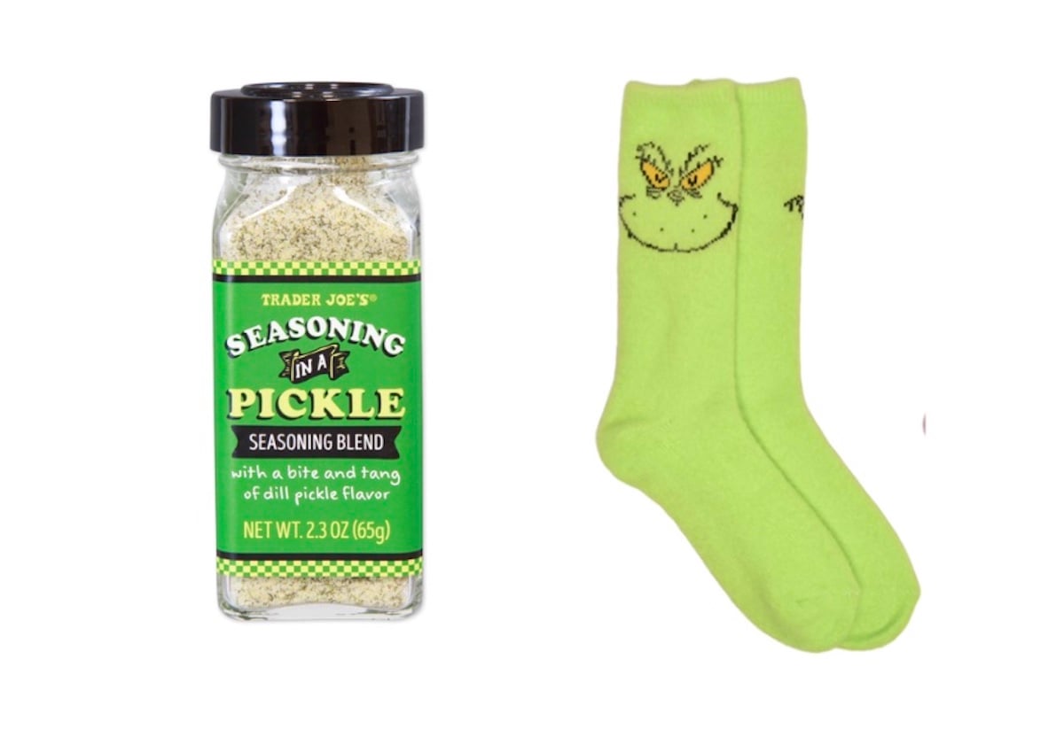 A jar of Trader Joe’s Seasoning in a Pickle blend next to a pair of light green socks with a cartoon face on them, both on a plain white background.