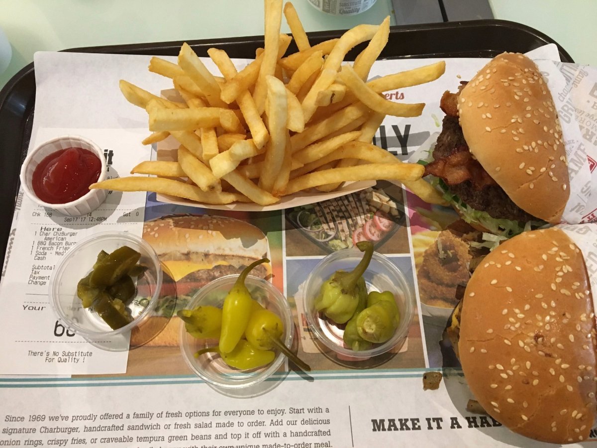 A tray of food with a burger and fries