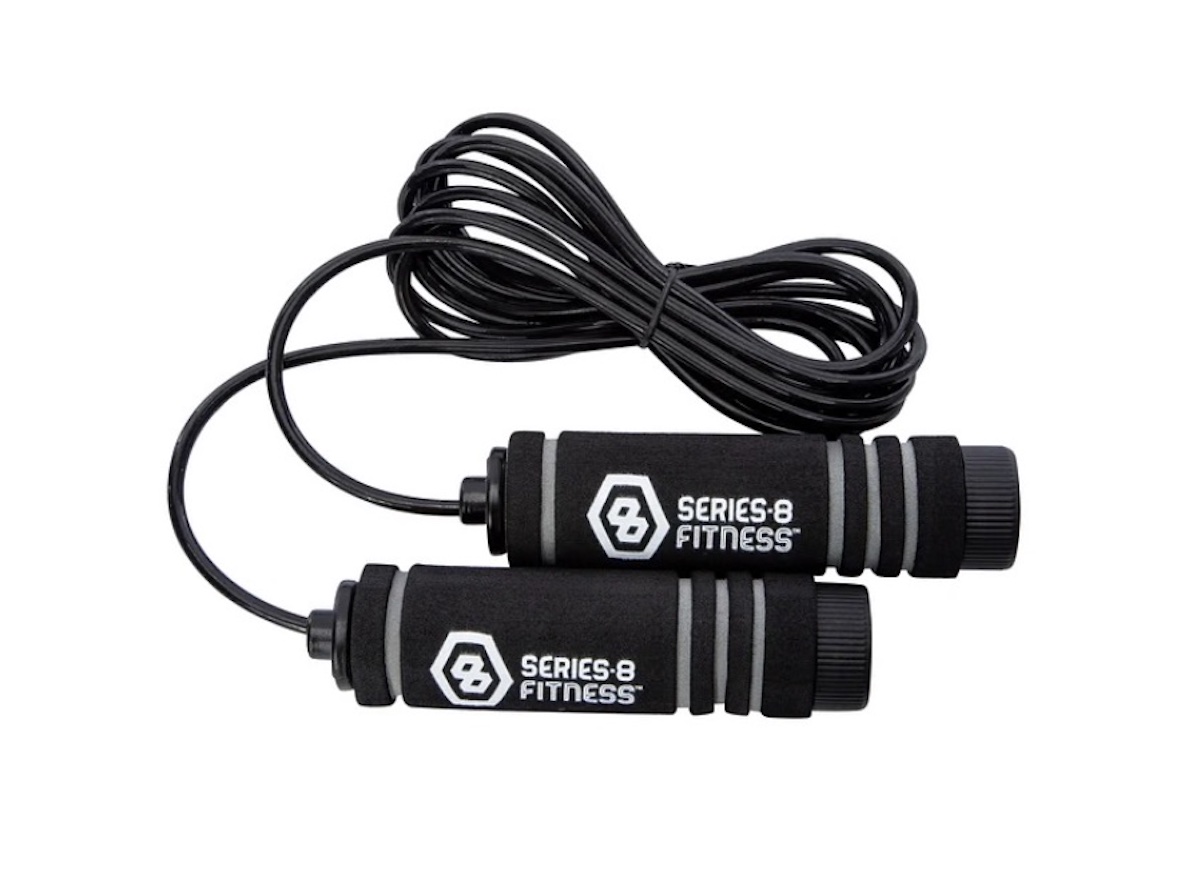 Black jump rope with foam handles labeled "SERIES-8 FITNESS" in white text, coiled neatly on a white background.