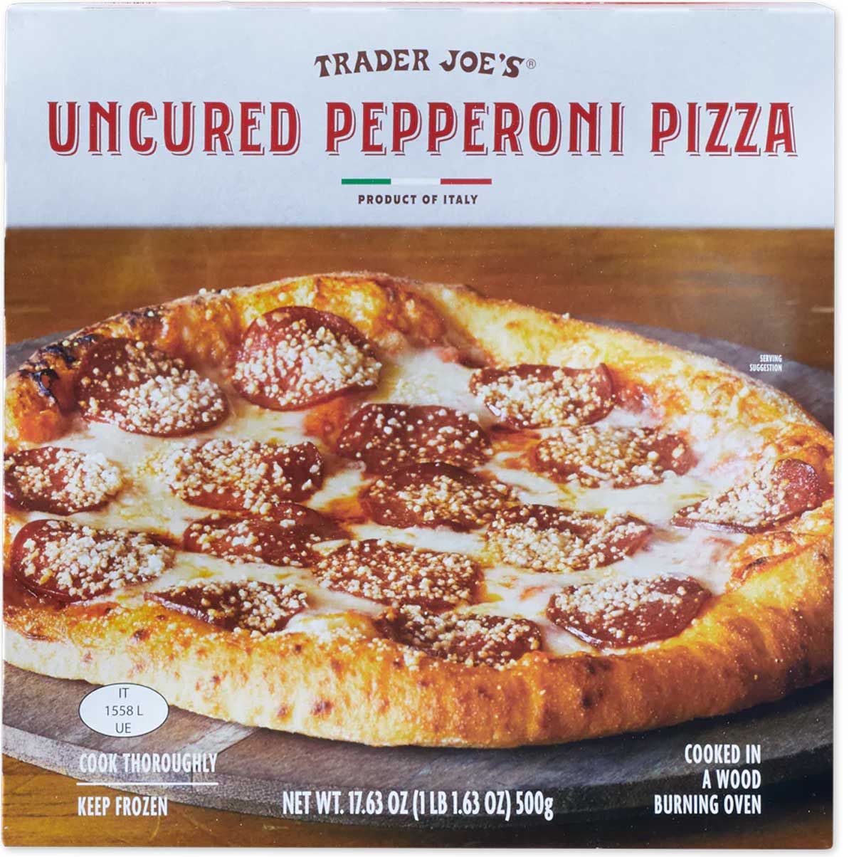 A Trader Joe’s box of uncured pepperoni pizza, featuring a photo of a cooked pepperoni pizza with cheese on a wooden surface. The box notes it is cooked in a wood burning oven and weighs 17.63 oz (500g).