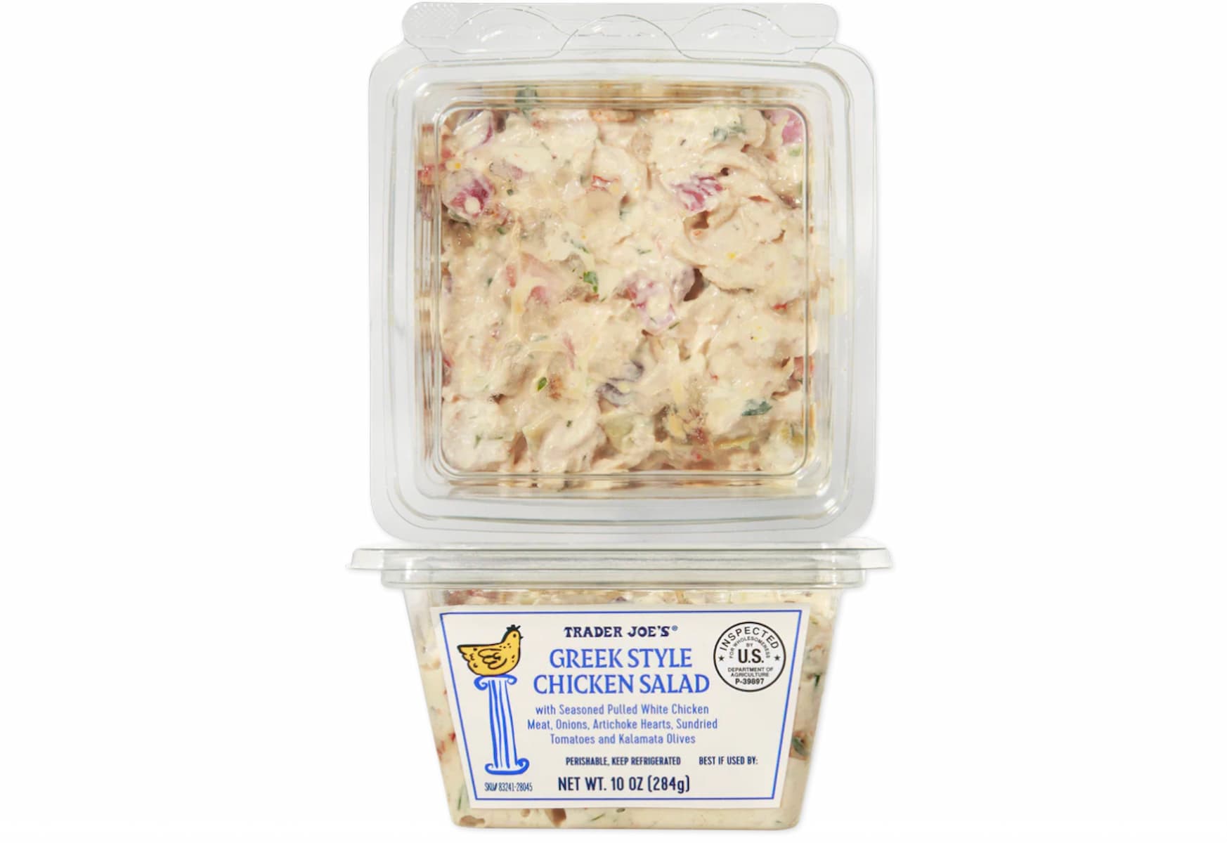 A plastic container of Trader Joe’s Greek Style Chicken Salad with a clear lid, showing a chunky mixture of chicken, dressing, and vegetables. The label is visible on the lower half of the package.