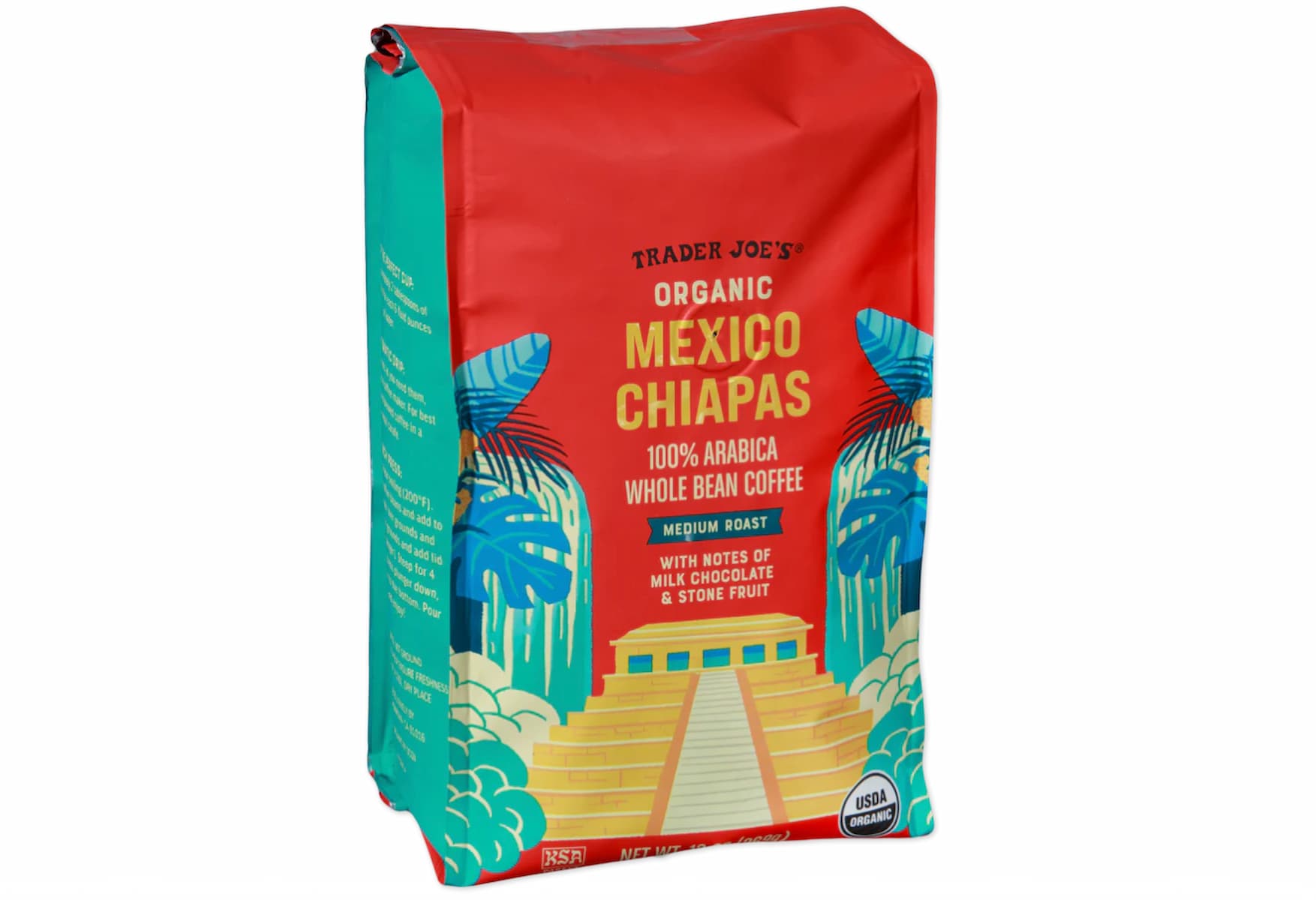 A colorful bag of Trader Joe’s Organic Mexico Chiapas whole bean coffee, featuring bold red, yellow, and turquoise colors with an illustration of a pyramid, palm leaves, and text describing medium roast with milk chocolate & stone fruit notes.