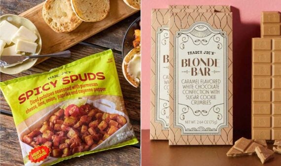A bag of new Trader Joe's products&mdash;Spicy Spuds diced potatoes&mdash;sits on a table beside butter and bread, while two Trader Joe&rsquo;s Blonde Bars with caramel white chocolate rest next to broken pieces of the bar on a wooden surface.