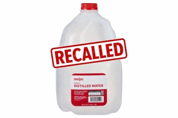 A gallon jug of Meijer Steam Distilled Water with a large red "RECALLED" stamp across the front of the container.
