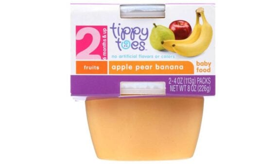 A container of Tippy Toes baby food labeled &ldquo;apple pear banana.&rdquo; The packaging, unaffected by any baby food recall, shows images of the fruits and states it&rsquo;s for babies 2 months and up. Net weight: 8 oz (226g), in two 4 oz packs.