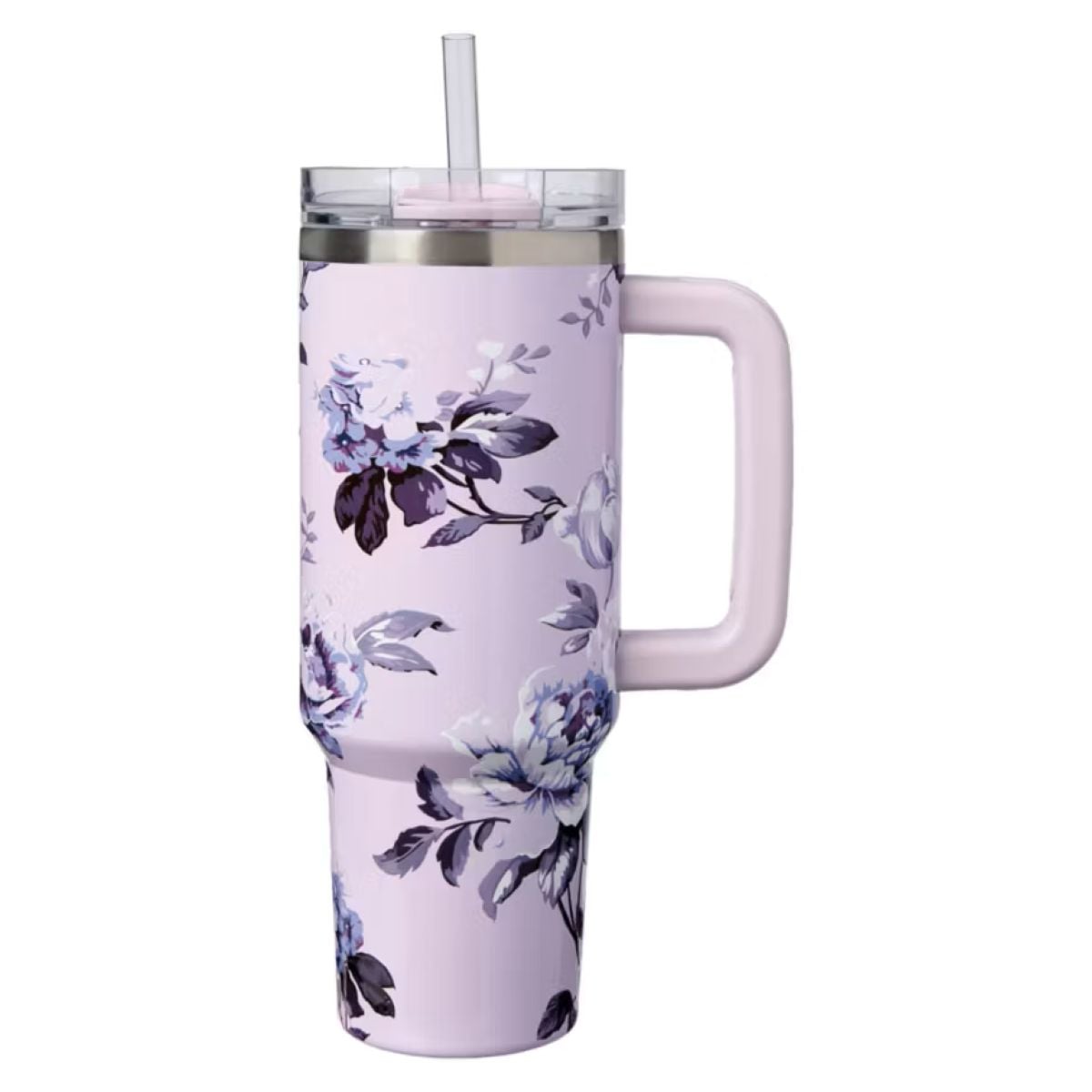 A large pink travel tumbler with a handle, decorated with purple and white floral patterns, a clear plastic lid, and a reusable straw.