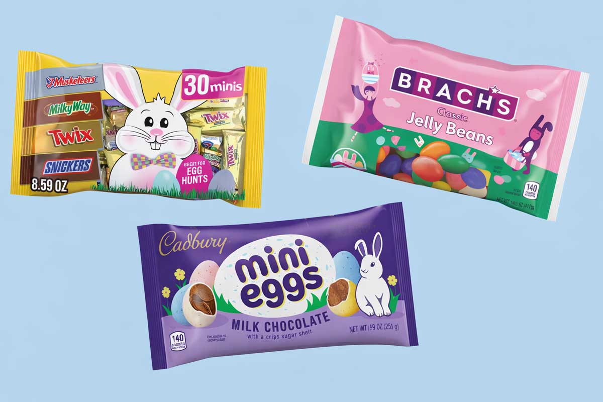 Three colorful bags of Easter candy on a light blue background: a bag of assorted chocolate bars with a bunny, Brach’s classic jelly beans, and Cadbury Mini Eggs featuring a charming bunny illustration.