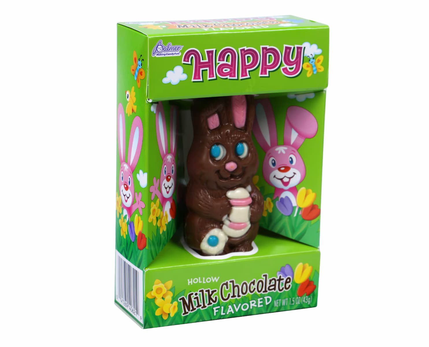 A hollow milk chocolate bunny with colorful details is displayed in a green box decorated with cartoon rabbits, flowers, and the word "HAPPY" at the top. The packaging is cheerful and spring-themed.