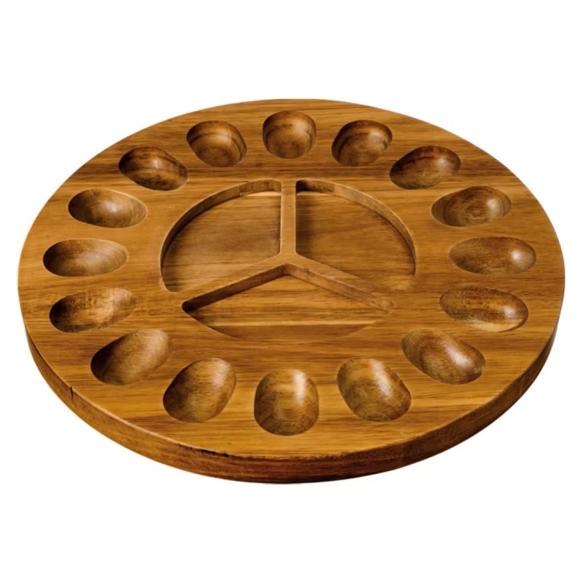 A round wooden mancala game board with twelve small oval pits around the edge and two large semi-circular stores at each end, featuring a carved divider in the center.