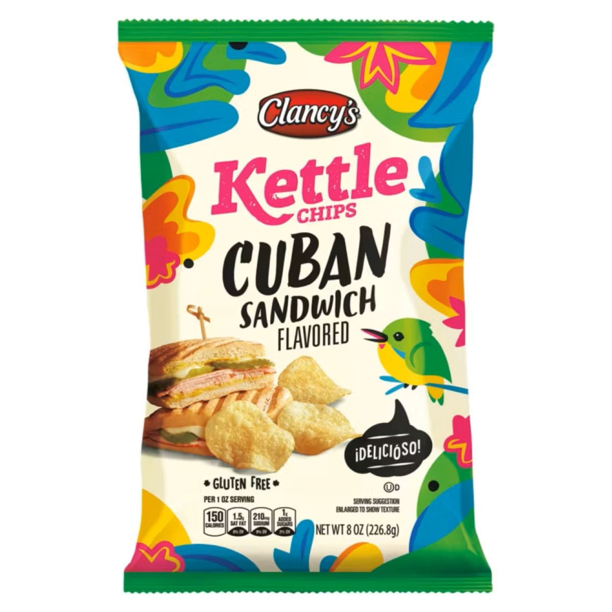 A colorful bag of Clancy’s Kettle Chips in Cuban Sandwich flavor, featuring an image of chips and a sandwich, with tropical floral and bird illustrations on the packaging. The bag is labeled gluten free.