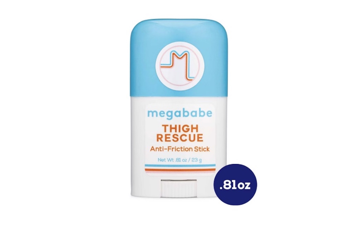 A blue and white stick of Megababe Thigh Rescue Anti-Friction Stick, 0.81 oz size, is shown upright with its label visible and a blue circle highlighting the size—perfect for tossing in your bag for spring break adventures.