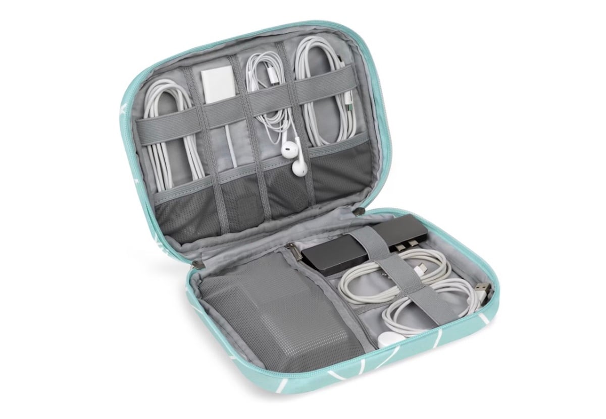 A teal zippered organizer case open to show neatly stored electronic accessories, including cables, earphones, and chargers—perfect for keeping essentials ready and organized for your next spring break adventure.