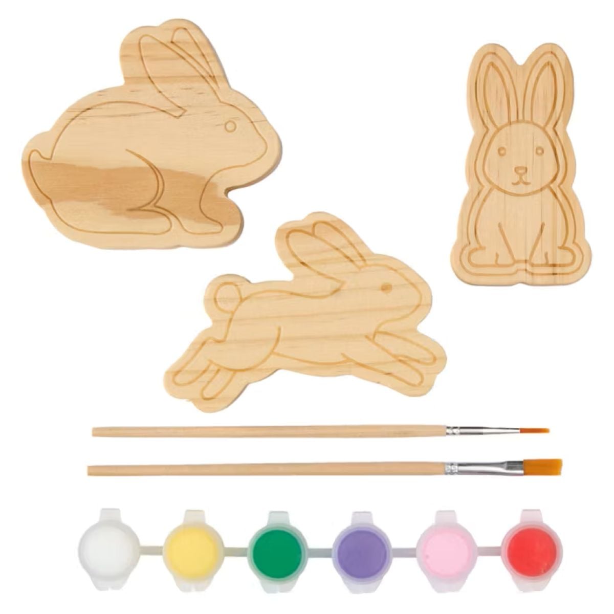 Three unfinished wooden bunny shapes, two paintbrushes, and six small pots of colorful paint (white, yellow, green, pink, purple, red) are arranged on a white background.