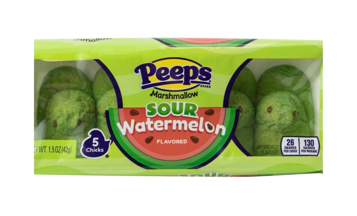A package of Peeps marshmallow candies in sour watermelon flavor, showing five green chick-shaped marshmallows inside a green and pink box.
