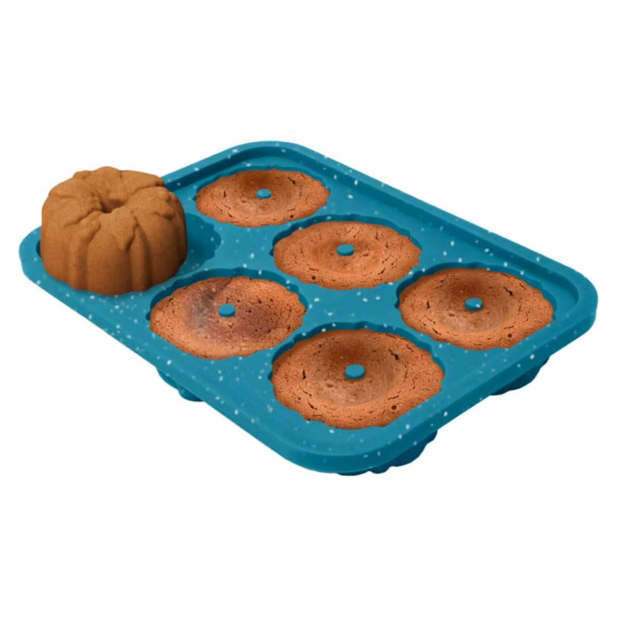 A blue silicone baking tray with five circular molds, four filled with baked chocolate cakes and one cake removed, showing its bundt-like shape.