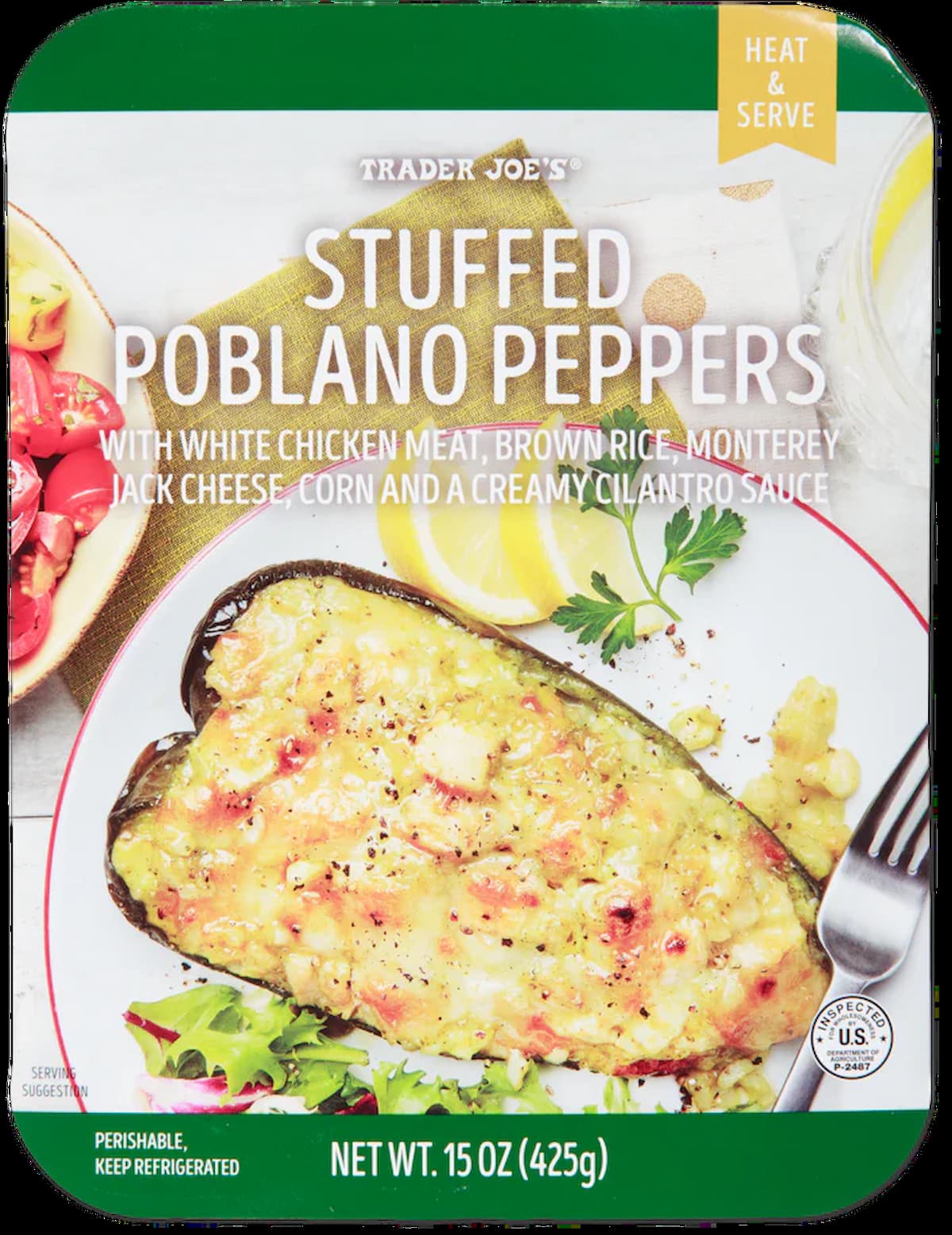 A package of Trader Joe’s Stuffed Poblano Peppers, featuring an image of a pepper stuffed with white chicken, rice, cheese, corn, and creamy cilantro sauce. The packaging highlights "heat & serve" and weighs 15 oz (425g).