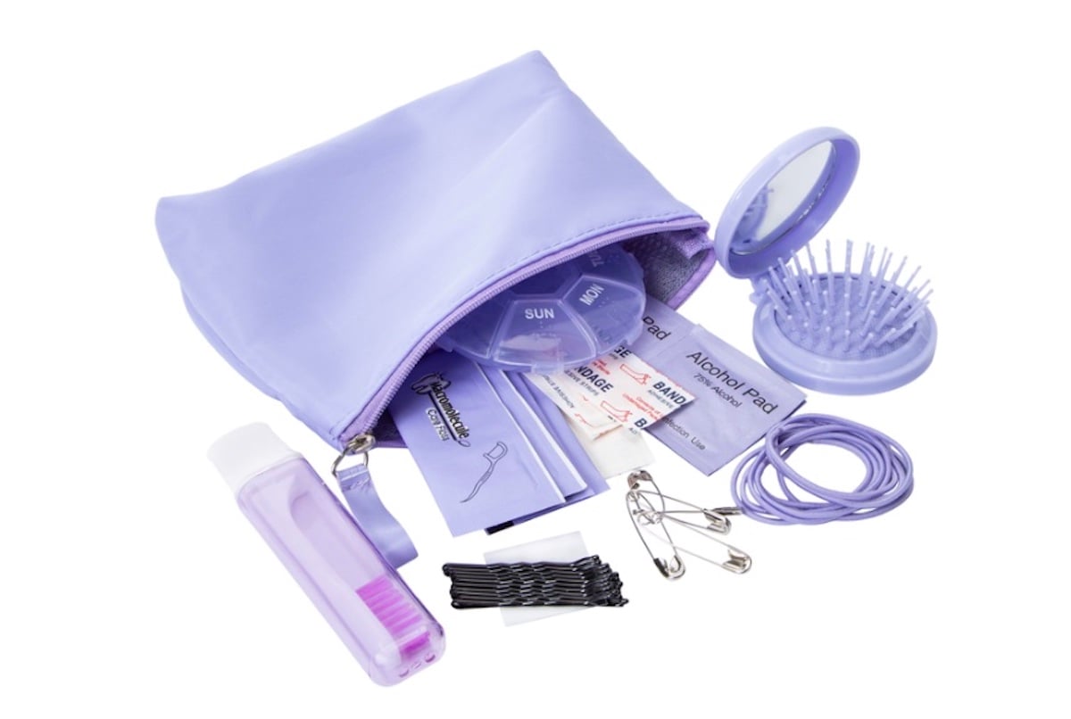 A five below finds lavender pouch with personal care items, including a mirror-hairbrush combo, pill organizer, comb, hair ties, bobby pins, safety pins, alcohol pads, bandages, and a small bottle.