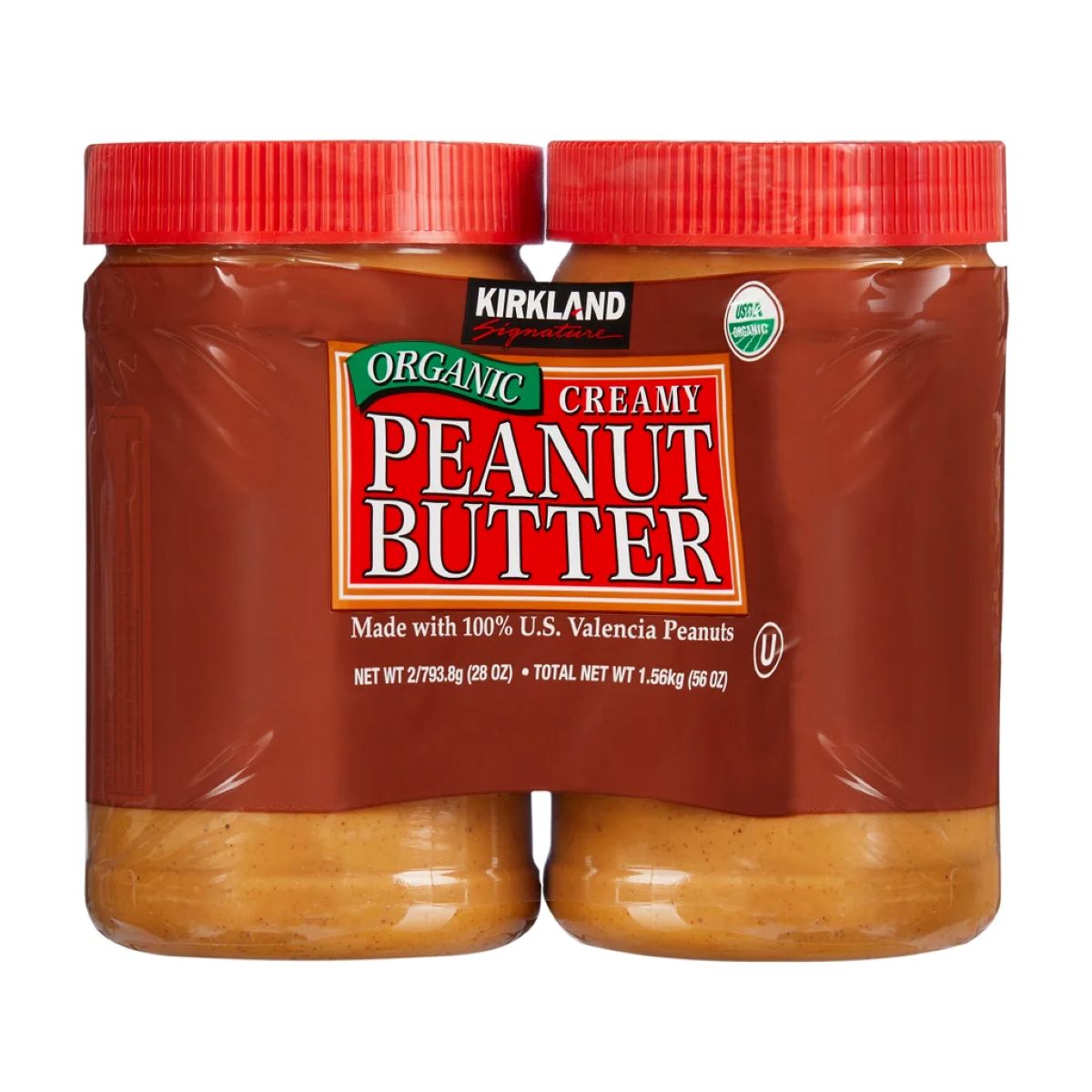 Two jars of Kirkland Signature Organic Creamy Peanut Butter with red lids, packaged together. The label states it is made with 100% U.S. Valencia peanuts and each jar weighs 28 ounces.
