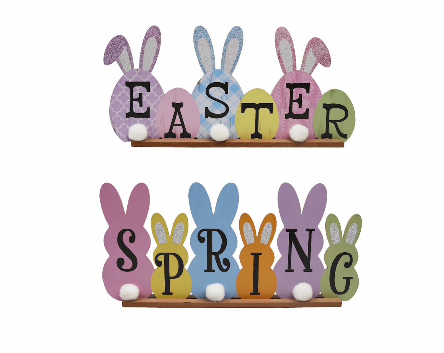 Two decorative wooden signs featuring colorful bunny silhouettes with pom-pom tails. The top sign spells "EASTER" and the bottom sign spells "SPRING," each with bold black letters on the bunnies.