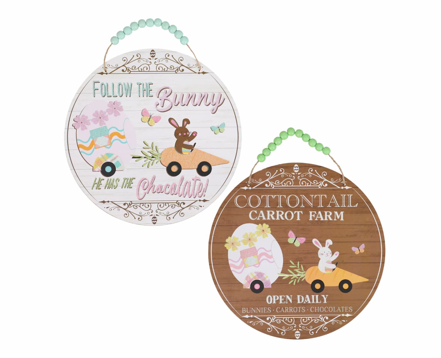 Two round Easter signs with beaded handles. One says "Follow the Bunny, he has the chocolate!" with a bunny and egg in a carrot car. The other says "Cottontail Carrot Farm, Open Daily" with a bunny and egg in a carrot car.